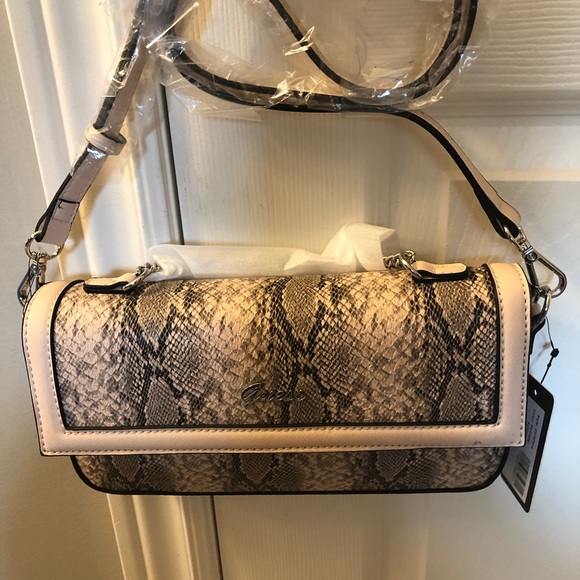 Guess Handbags - ❗️SOLD❗️ Guess womens crossbody purse in snakeskin